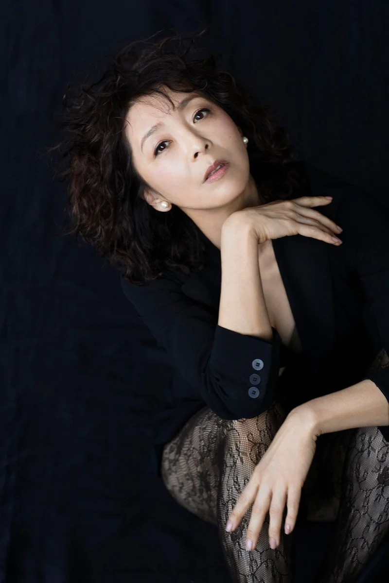 57歳の有森也実のポートレート
