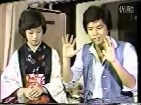 山口百恵と番組に出演する三浦友和