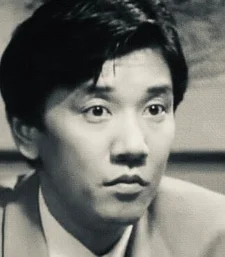奥田瑛二の若い頃のモノクロポートレート