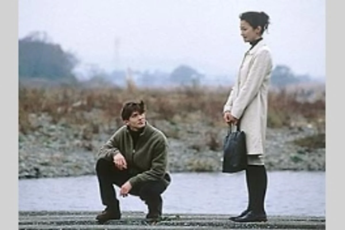 安田成美の2001年34歳ごろの映画『大河の一滴』場面画像