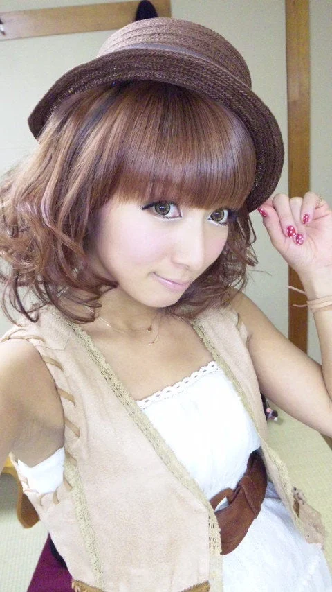 2010年22歳の辻希美の帽子コーデ
